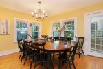Formal dining is open to the living room and adjacent to the kitchen